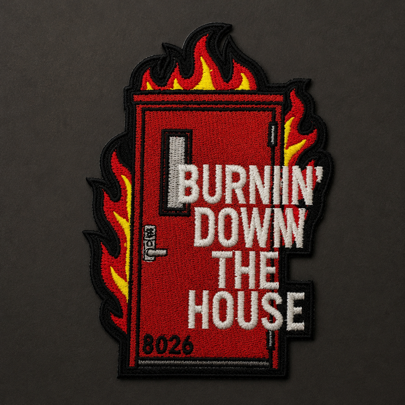 An embroidered patch featuring a red door with flames in yellow, orange, and red around it, and the text 'BURNIN' DOWN THE HOUSE' in white. The patch is displayed on a dark gray textured background.