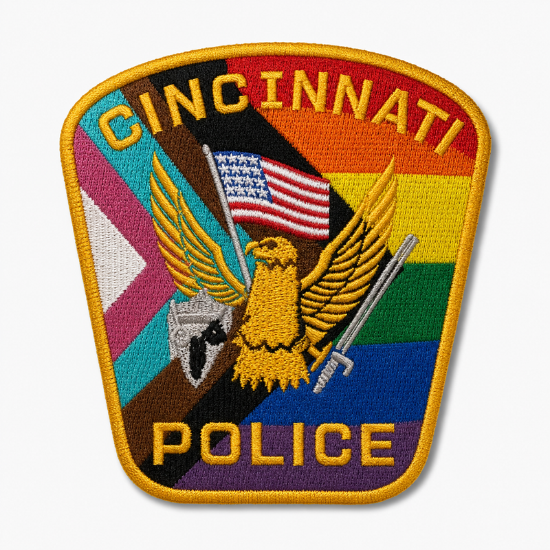 An embroidered Cincinnati Police patch featuring a gold eagle holding a U.S.